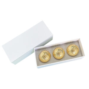 White box golden golf ball